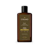 Cremo 2-in-1 shampoo and conditioner bottle, Fresh Timber scent, amber-brown