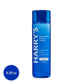 Blue facial toner bottle, 8.35 oz, clear pump cap and label detail