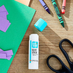 Pen+Gear washable glue stick on wood craft table with paper shapes