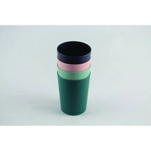 Green plastic tumbler with black lid and pink color band