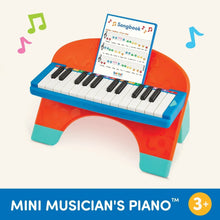 Mini musician's piano toy with open songbook and 3+ label