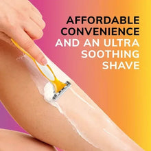 Women’s razor with yellow handle held for shaving