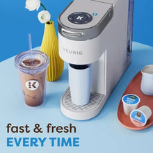 Keurig K-Iced Plus single serve coffee maker in gray with iced and hot cups