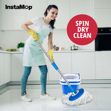 Person using spin mop with blue bucket and white microfiber head