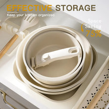 Cream white stackable pots and pan set with a removable handle for storage