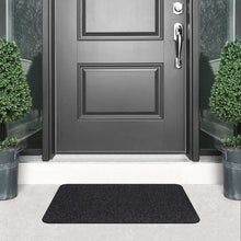 Charcoal tri-rib doormat, loop-textured surface and rounded rectangular corners.
