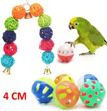 Hanging bird toy with multicolor yarn balls, bells, and small ball toys