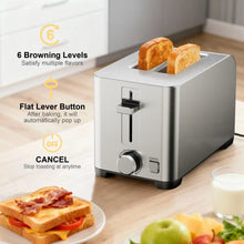 Stainless steel 2-slice toaster with lever and two toast slices in the slots