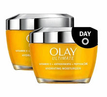 Hydrating facial moisturizer jars, amber gel tone with silver lids, OLAY Ultimate