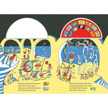Open sound book spread with drummers, trumpeters, and a red semicircular sound button panel.
