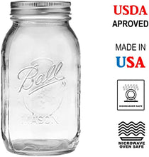 Wide-mouth clear glass mason jar with metal lid, embossed logo on front