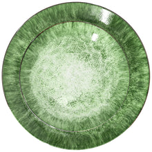 Green porcelain dinner plate with speckled center and two-tone rim