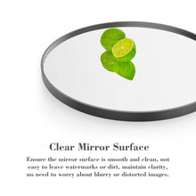 Round mirror with gray metallic frame and clear reflective surface