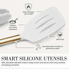 White silicone spatula with gold handle and stainless-steel end piece