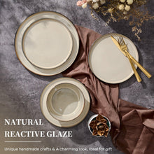 Khaki reactive-glaze ceramic plates and bowls with thin gold outer rim