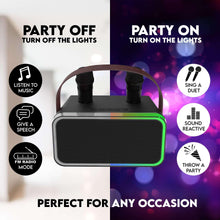 Karaoke speaker with two wireless microphones and multicolor LED light display