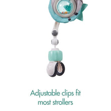Hanging clip connector for stroller toy arch with teal case and black-and-white hook