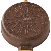 Speckled brown pan base with The Pioneer Woman logo medallion