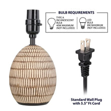 Ceramic table lamp with beige shade, bulb socket, and 5.5 ft power cord