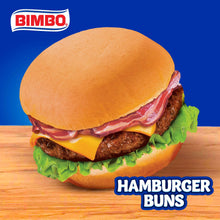 Hamburger sandwich with bun top and fillings including cheese, patty, and lettuce