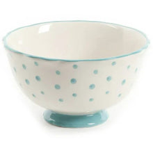 Ceramic serving bowl with white finish, teal dot pattern, and teal pedestal base