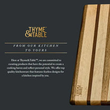Multi-wood butcher block cutting board with striped wood side edge and etched logo