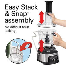 Food processor snap-lock lid and feed tube assembly on black and stainless base