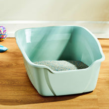 Enclosed hooded cat litter box with mint-green interior and white front wall