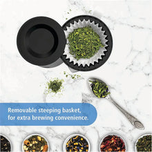 Removable steeping basket with loose tea leaves and black lid/basket