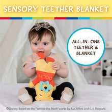 Sensory teether blanket featuring plush Winnie the Pooh with star teether and crinkle