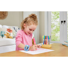 Blue wrist watch with cartoon character on strap as a child writes