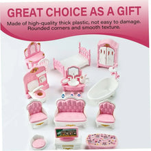 Pink miniature dollhouse bathroom and bedroom furniture accessories arranged flat.