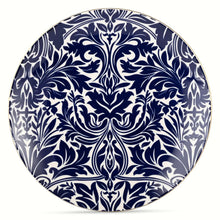 Blue and white patterned ceramic dinner plate, round with ornate motif