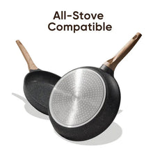Nonstick frying pan set with wooden handles and gray metal base disc, upside view