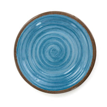 Blue rippled melamine dinner plate with concentric swirl design and brown edge