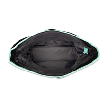 Open black diaper tote with mint-trim top edge and interior storage compartment