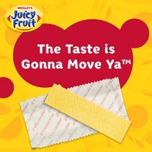 Juicy Fruit Original gum pack with wax paper gum pieces on yellow background