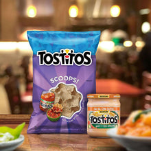 Tostitos Salsa con Queso medium jar beside tortilla chips scoop bag