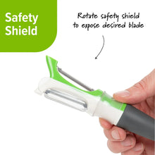 Dual-sided peeler with safety shield, green and white body and gray handle