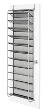 Over-the-door shoe rack mounted on door with gray mesh shelves.