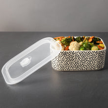 Dot-pattern rectangle ceramic baking dish with open lid and vegetables inside