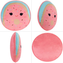 Set of round plush pillows with pink donut faces, blue inner trim