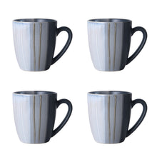 Gray stoneware mugs with vertical stripe glaze and dark handles