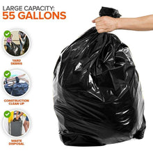 Black heavy-duty trash bag with gathered top, held by one hand