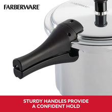 Pressure cooker with black side handle and steam vent on metal lid