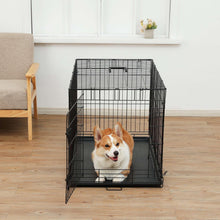 Black metal dog crate with single door, dog resting on black base tray