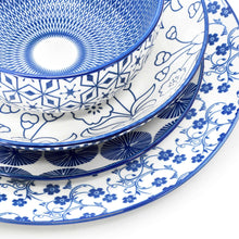 Blue porcelain plate rim with geometric and floral patterns