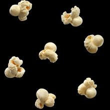 White cheddar flavored popcorn pieces