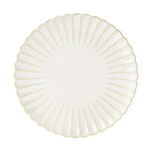 Cream scalloped stoneware dinner plate, ridged rim