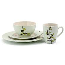 Off-white stoneware dinner plate, shallow bowl and mug with floral branch motif